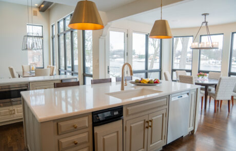 Kitchen with a sink in the island overlooking the river